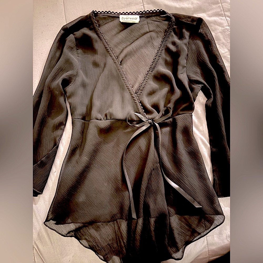 Black blouse with a ribbon bow